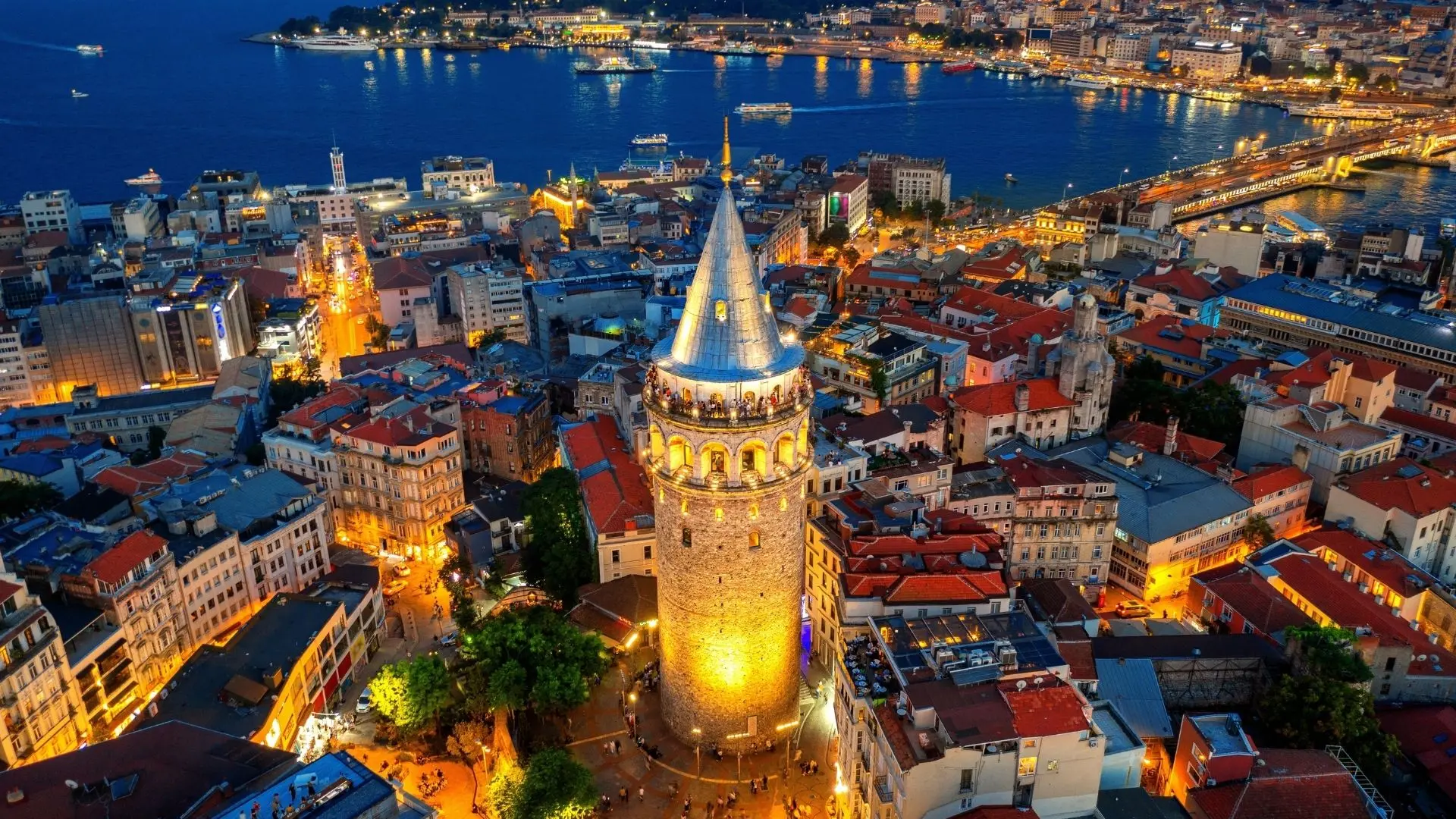 Galata Tower and the Beyoğlu skyline lit up at night